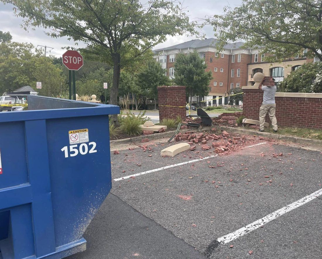 Integrity Roll Off 15 yard dumpster loaded on a tear-out job